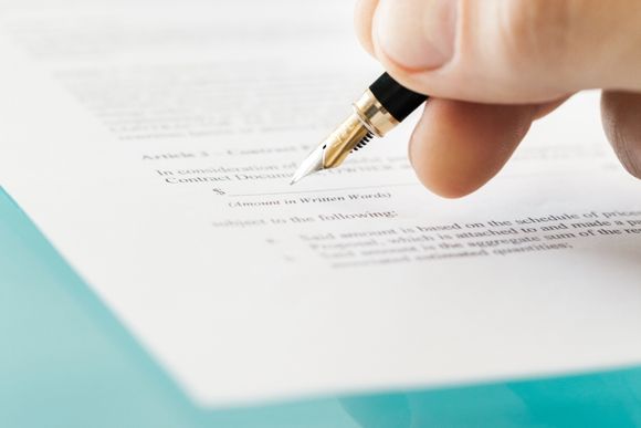 Signing the AMC Agreement